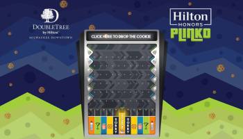 Branded plinko game with a logo-branded drop board background