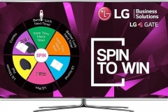 Trade show booth prize wheel game with a lead capture form