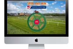 Trade show booth paired with a branded prize wheel game