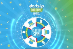 Trade show booth display showing a branded wheel game countdown to spin